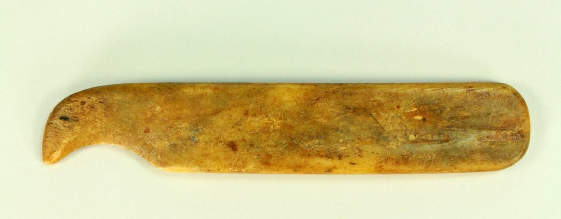 19th C. Native American Leather Tool / Knife Bison Bone: Native American leather tool, hand carved from bison bone, some kind of knife used to clean the bison leather. It comes from Pennsylvania, Shawnee or Sasquehannock tribes. An original 19th century tri