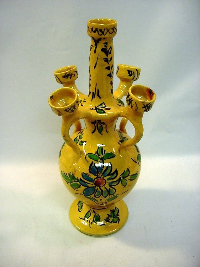 Persian Majolica Royal Yellow Vase/Candle Holder: Made of Majolica earthenware, heavily glazed and all hand painted - polychrome floral motifs on a thick yellow background, done in a traditional manner. Most likely held four candles in incenses on th