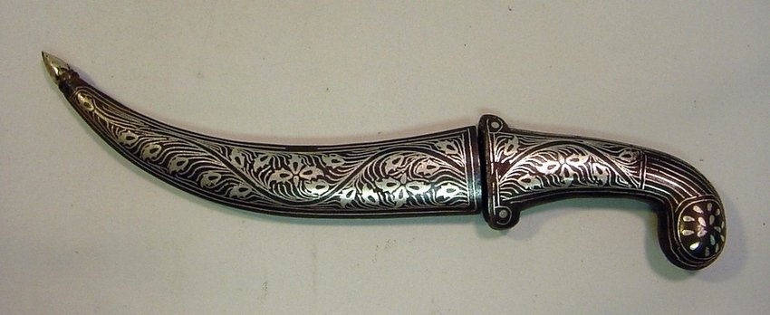 Indo-Persian NIELO Damascened 9" Curved Dagger: Janbiya, Khanjar curved dagger. Indo-Persian in origin from the late 1800's/early 1900's. Damascened steel with inscriptions on the blade. Measurements: Approx. 9" long, 5.25" the blade