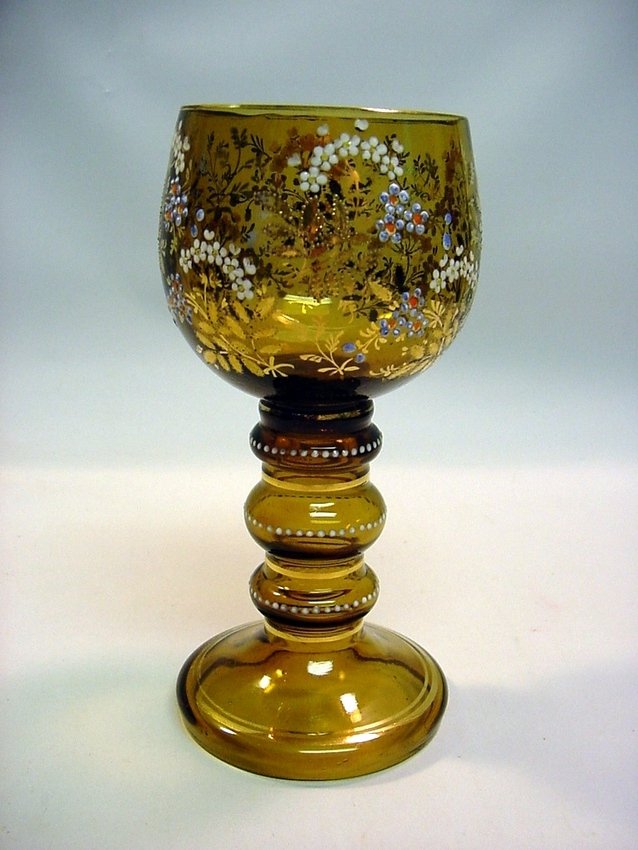 Bohemian Enameled Amber Glass Rummer Chalice: Raised Chalice Goblet or Rummer. Hand blown from amber glass. Hand enameled pointillist floral decorations. Bohemian, c. mid/late 1800's. Measurements: Approx. 7.25" high, 3.5" diameter