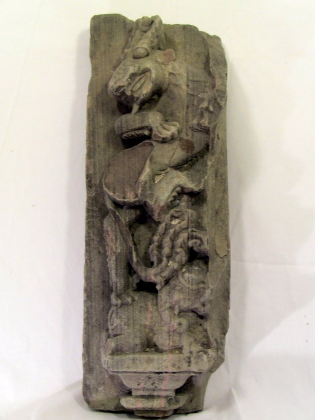 Tibetan Carved Gray Shist Stone Altar Aut-Relief: Hand carved with high relief details. A dragon over an Elephant figure. Most likely an Aut-Relief ornament from an altar or religious building. Tibet. Circa 18th/19th century.Measurements: Approx. 22"