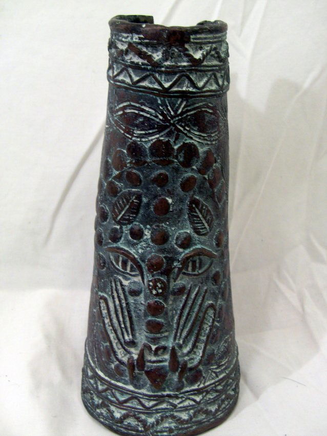 Antique Bronze DOGON Tribe Mali Bracelet Currency: Cast Bronze/Copper. Traditional style facial decorations. Anklet or Bracelet. Graduates into a smaller opening at the top. Recognized as a form of money or currency. Dogon culture of Mali, West Africa