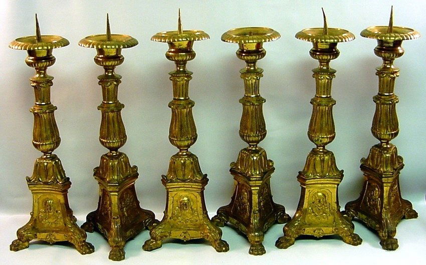 1850's GARNITURE of 6 Bronze D'Ore Altar Prickets: Garniture set of six candle holders. Heavy Bronze D'Ore with thick gilding, done by hand. Superb details. Triangle bases with religious scenes. French, circa mid/late 1800's. Measurements: Approx. 20.