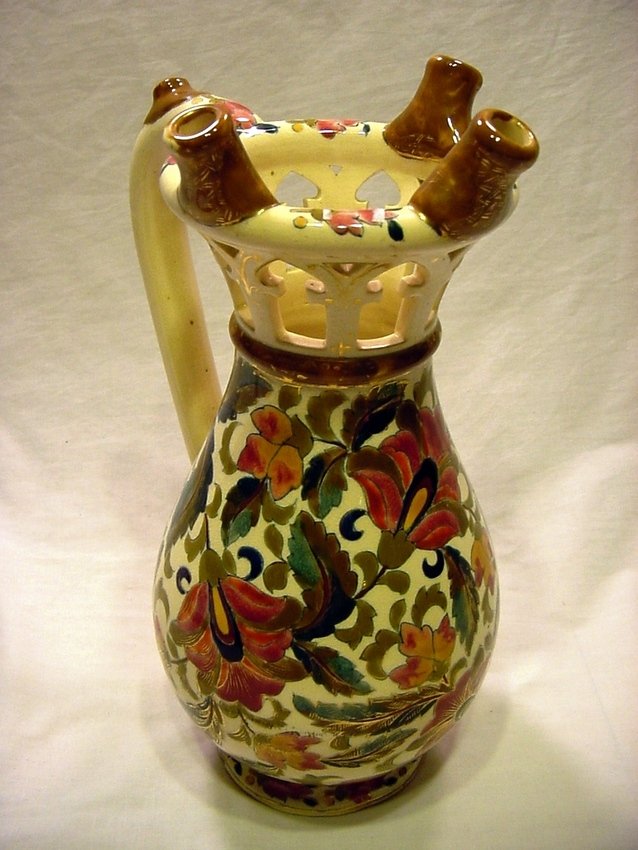 c.1864 IGNAC FISCHER Hungary Joke Tankard: An antique joke Novelty item - it was used to serve or drink from liquids, most likely wine or beer. The untrained user would most likely get spilled on all over, as the rim has holes. Such humor item