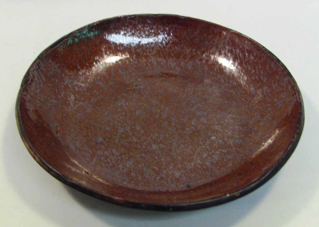 Early Tin Glazed Pennsylvania Redware Bowl: Thick red stoneware, with a layer of tin glaze on the inside. Came from Lancaster County, Pennsylvania. Circa early 1800's. Measurements: Approx. 7" diameter, 1.25" deep