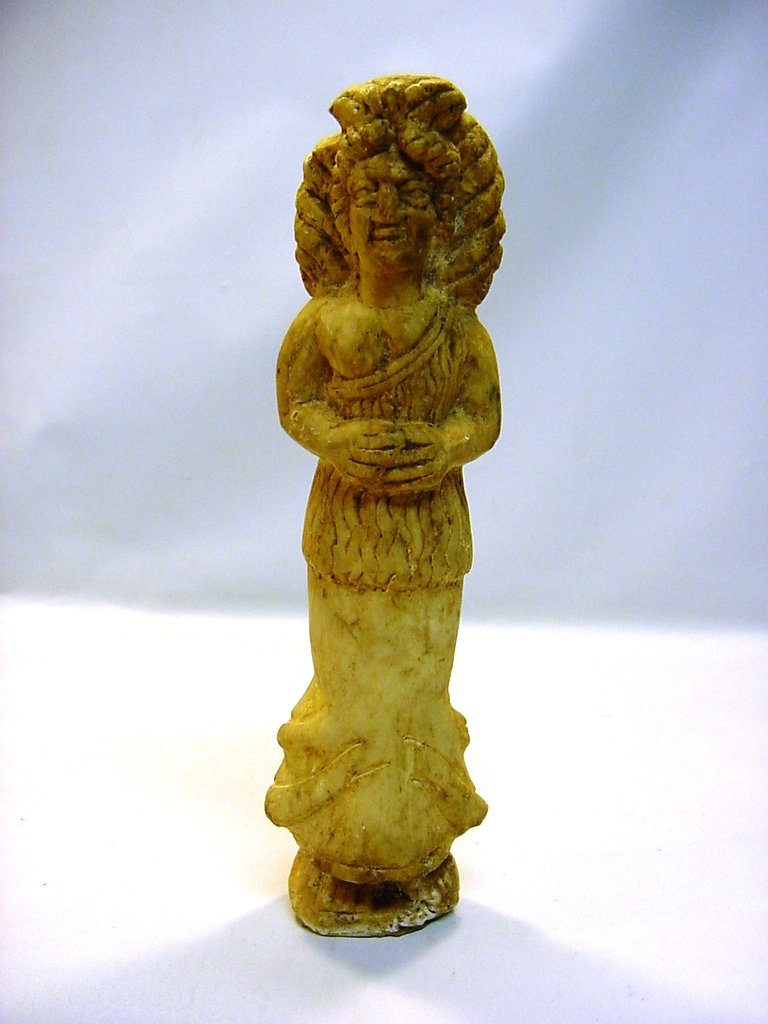 II-I Millenium B.C. Kassite/Elamite Stone Goddess: A very impressive carved stone female figurine, possibly a Goddess. Carved out of one piece of white marble or alabaster. Possibly Kassite/ Elamite peoples, II-I Millenium B.C. Measurements: 10.5" hig