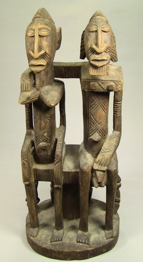 c.1900 W.Africa Wood FAMILY Man & Woman Figure Statue: Antique figure of a man and woman. Possibly a Fertility statue. All hand carved from one piece of native exotic wood. West Africa. Circa early 1900's. Measurements: 20" x 8" x 8"