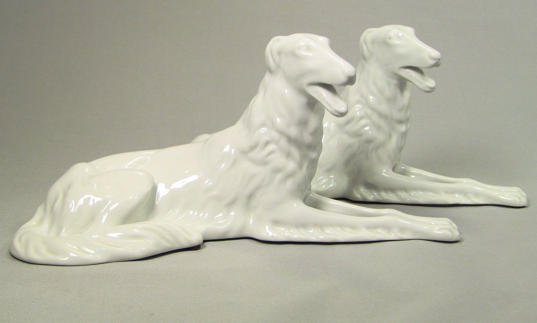 ROYAL DUX Fine White Porcelain Pair Hound Dogs Figures: Fine white porcelain. Pair of hunting hound dogs. Well marked: ROYAL DUX BOHEMIA with the pink Triangle relief mark and a blue underglaze mark. Some number marks as well. Made in Czechoslovakia. Vinta