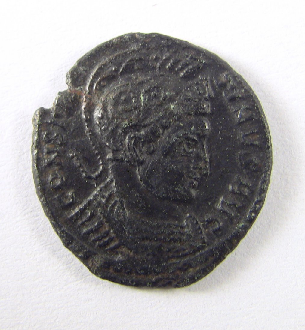 322-323 AD CONSTANTINE I Bronze AE Trier: Roman Coin, struck 322-323 AD in Trier, a military issue. Avers: Helmeted bust of Constantine I, right. Reverse: Globe set on altar, inscribed; three stars above. Reference: RIC 368. Measurements: App