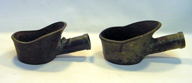 Qianlong (1736-95) Near Pair Cast Iron Charcoal Irons: A near pair of two early Chinese open coal irons. Heavy and thick cast iron. China, Qing Dynasty, Qianlong period (1736-1795). Measurements: The larger: 9" long x 4" high, 5.5" in diameter (23 cm x 10