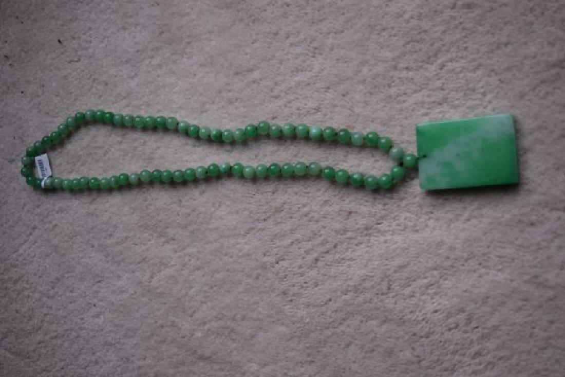 Chinese jade necklace and pendent. (1 of 2)