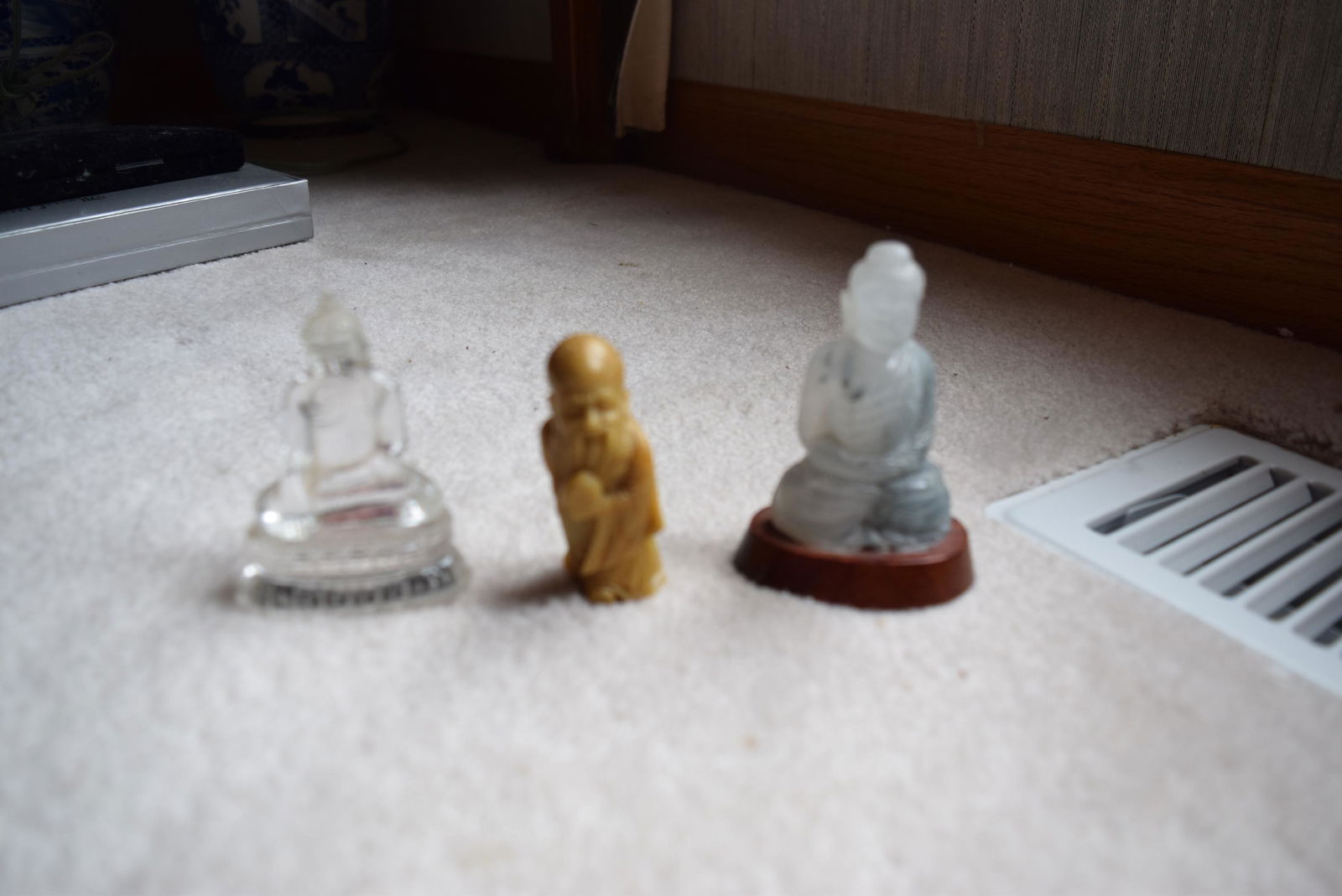 Three Chinese carvings. (1 of 12)