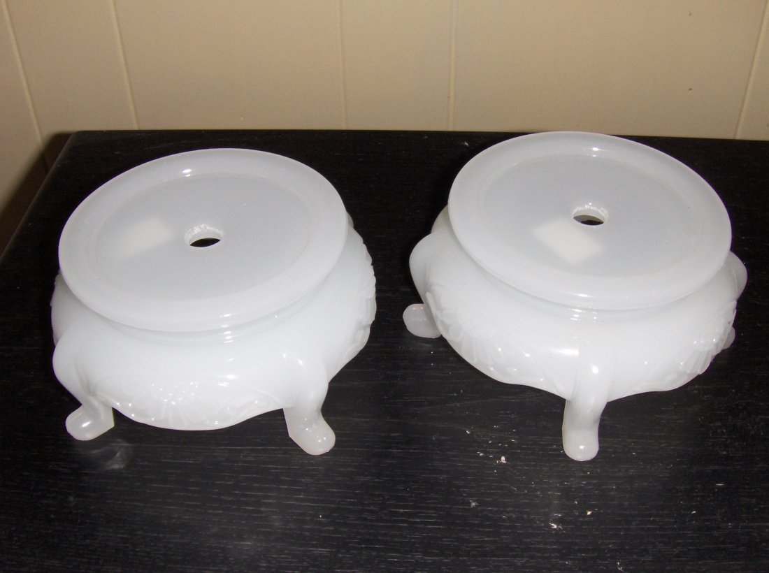 A pair of glass bottom holders