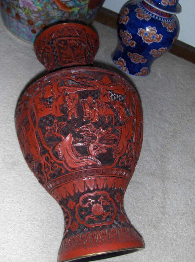 Chinese cinnaba vase: Chinese vase, possible qing dynasty. very detailed, nice carving. possible antique! 19 inches tall. We are selling at very low price, normally on ebay, this item can be upto $1800