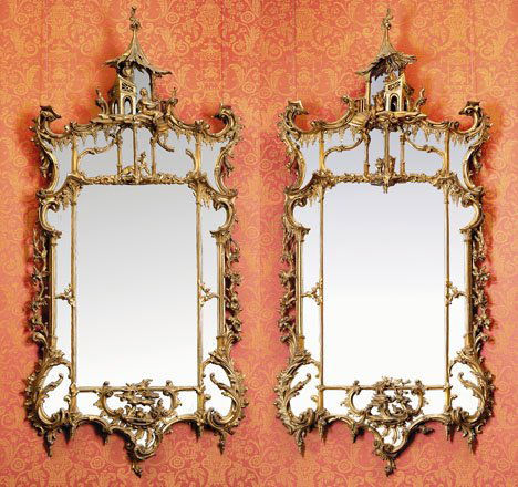 Impressive pair of George III style carved giltw: Impressive pair of George III style carved giltwood mirrors 19th century In the manner of Thomas Chippendale. H: 78, W: 36 in. PROVENANCE: From Ardrossan, The Estate of Robert Montgomery Scott