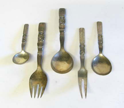 Pair of Georg Jensen scroll pattern salad servers: Pair of Georg Jensen scroll pattern salad servers post 1945 Designed by Johan Rohde; together with a meat fork and two serving spoons. (5). 10 oz.