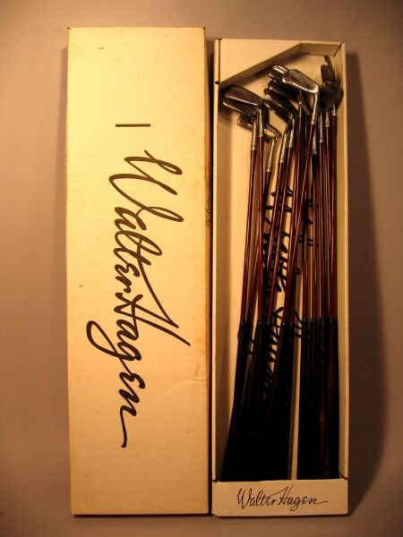 A set of thirteen Walter Hagen 'Tom-Boy' irons: A set of thirteen Walter Hagen 'Tom-Boy' irons, nos. 1-8, putter, 33, 44, 66 and ironman wedge, brown enamelled steel shafts, circa 1934, in later Walter Hagen box