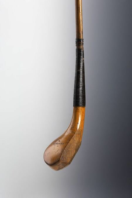A Tom Morris beech headed longnose driver: A Tom Morris beech headed longnose driver,horn insert to sole, lead counterweight, hickory shaft, circa 1885