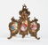 59: A Continental Gilt Metal and Enamelled Three Fold M