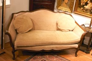 A Pair of Mahogany Settees, Width 62 1/2 inches.: A Pair of Mahogany Settees, having scrolling arms, raised on cabriole legs. Width 62 1/2 inches. Property from the Collection of Dr. and Mrs. Raymond O'Brien.
