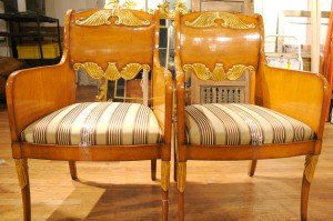 A Pair of Parcel Gilt Biedermeier Style Arm Chairs: A Pair of Parcel Gilt Biedermeier Style Arm Chairs, by Charles Pollock Reproductions. Height 39 1/4 inches.