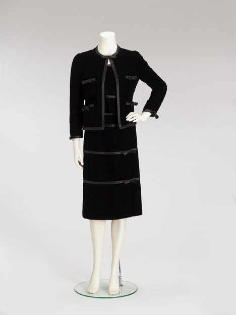 Chanel couture black velvet skirt suit jacket: Chanel haute couture black velvet three-piece skirt suit 1970s Consisting of a wraparound below-the-knee pencil skirt with three narrow satin bands with bow details; a shell; and a classic boxy open-f
