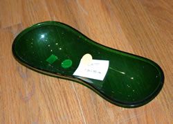 An Eva Zeisel Plastic Serving Dish,: for The Clover Box and Manufacturing Company, New York. Unmarked. Length 10 1/2 inches. Exhibited Akron Art Museum Useful Objects for the Home, November 2 - December 2, 1947.