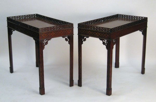 Pair of George III style mahogany tea tables, , T: Pair of George III style mahogany tea tables The rectangular top with a pierced gallery, raised on conforming square chamfered legs with pierced angle brackets. H: 32, W: 36, D: 18 in.