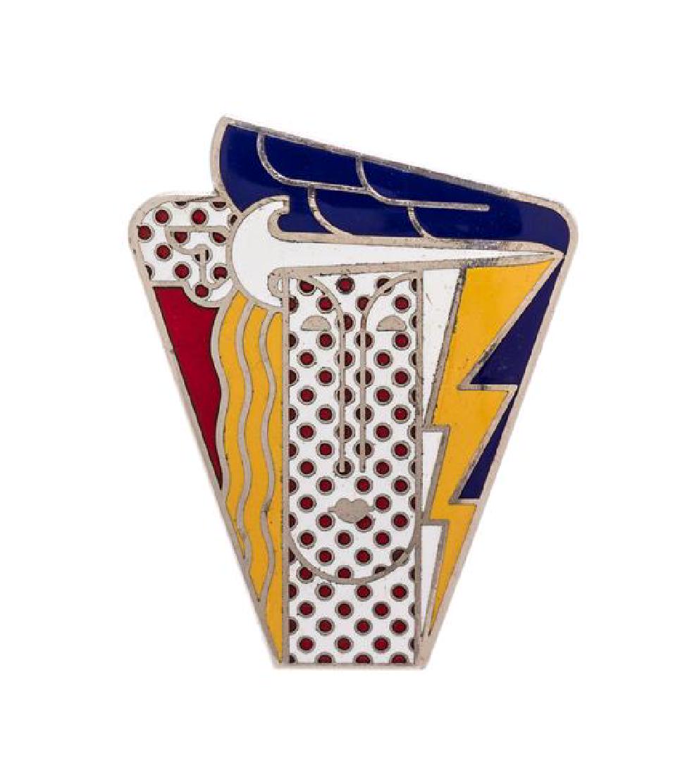 * A Metal and Polychrome Enamel 'Modern Head' Pendant (1 of 2)