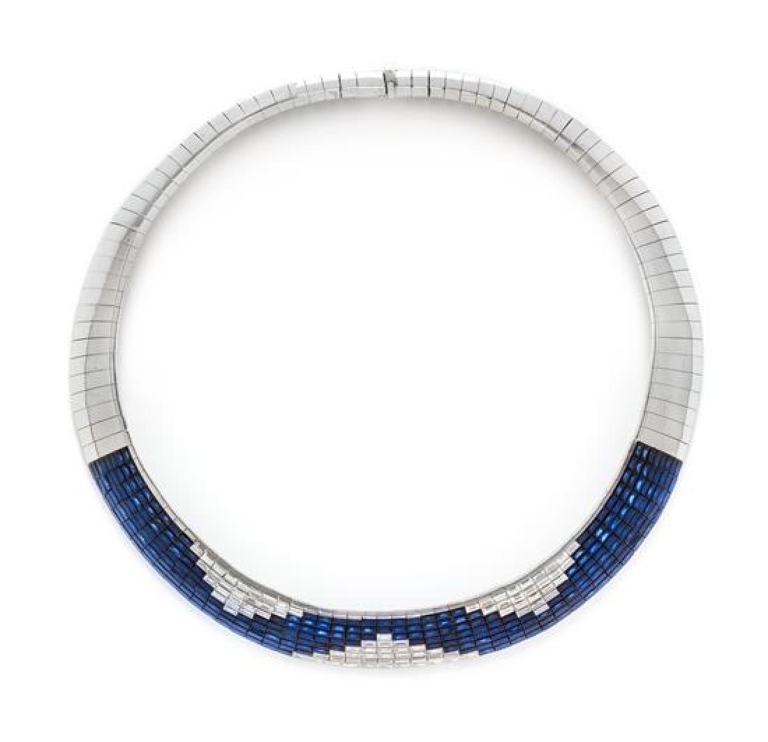 An 18 Karat Yellow Gold, Sapphire and Diamond Invisibly (1 of 1)