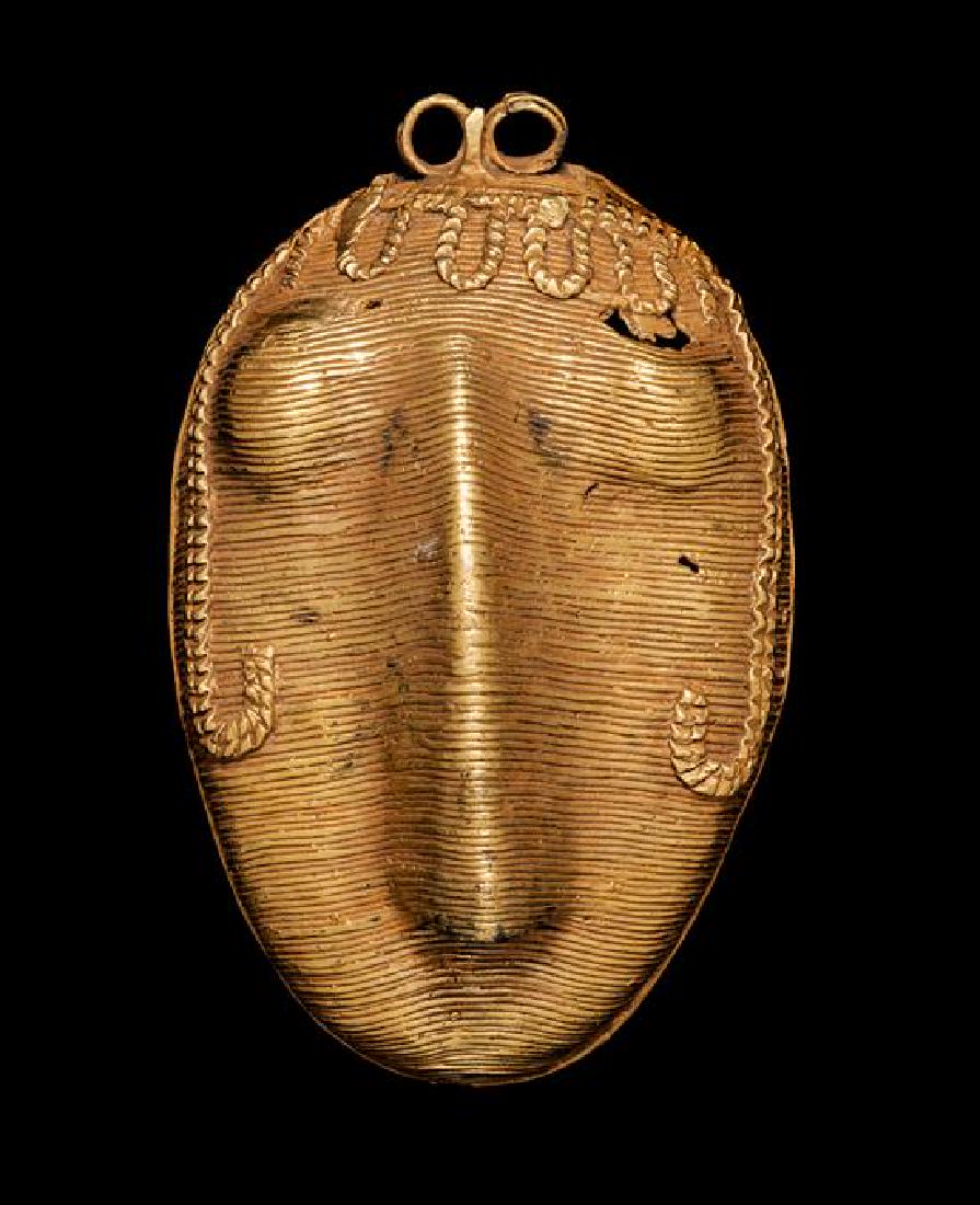 * An Akan Gold Alloy Pendant Mask, Côte (1 of 1)
