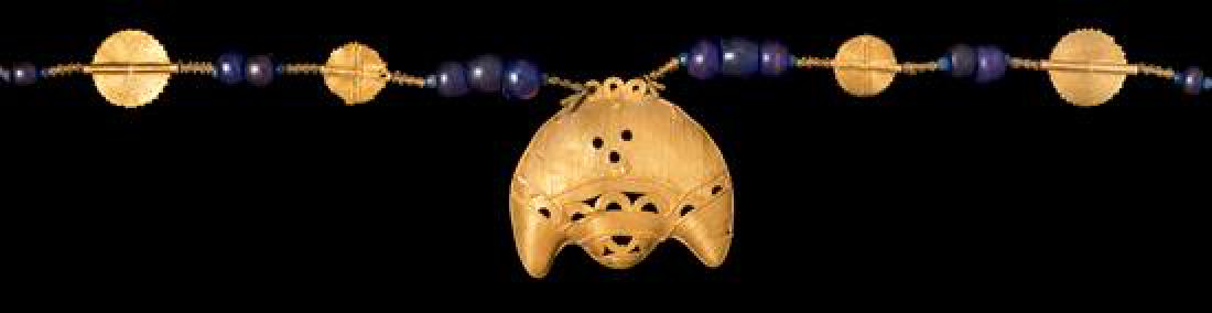 * An Akan Gold Alloy, Metal Alloy, Glass Bead and (1 of 2)