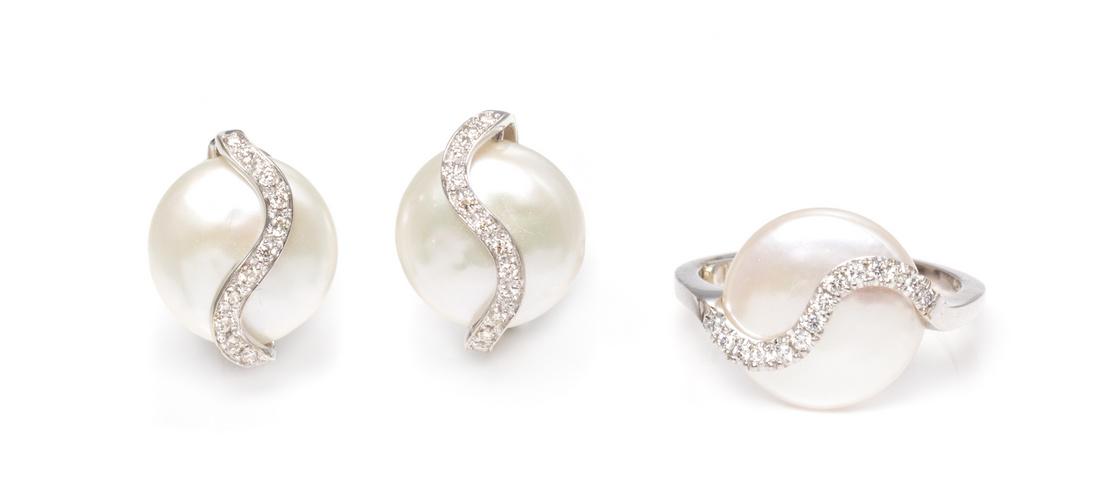 An 18 Karat White Gold, Sterling Silver, Cultured Coin (1 of 1)