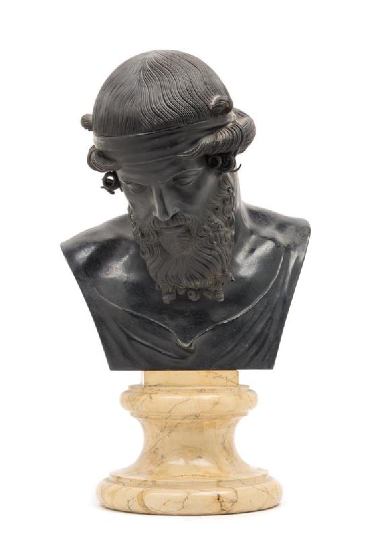 A Continental Bronze Bust: * A Continental Bronze Bust after the antique, 19th century raised on a marble socle. Height 15 3/4 inches. Estimate $ 600-800 Property from the Collection of Jonathan Hoffman, Chicago, Illinois In ov