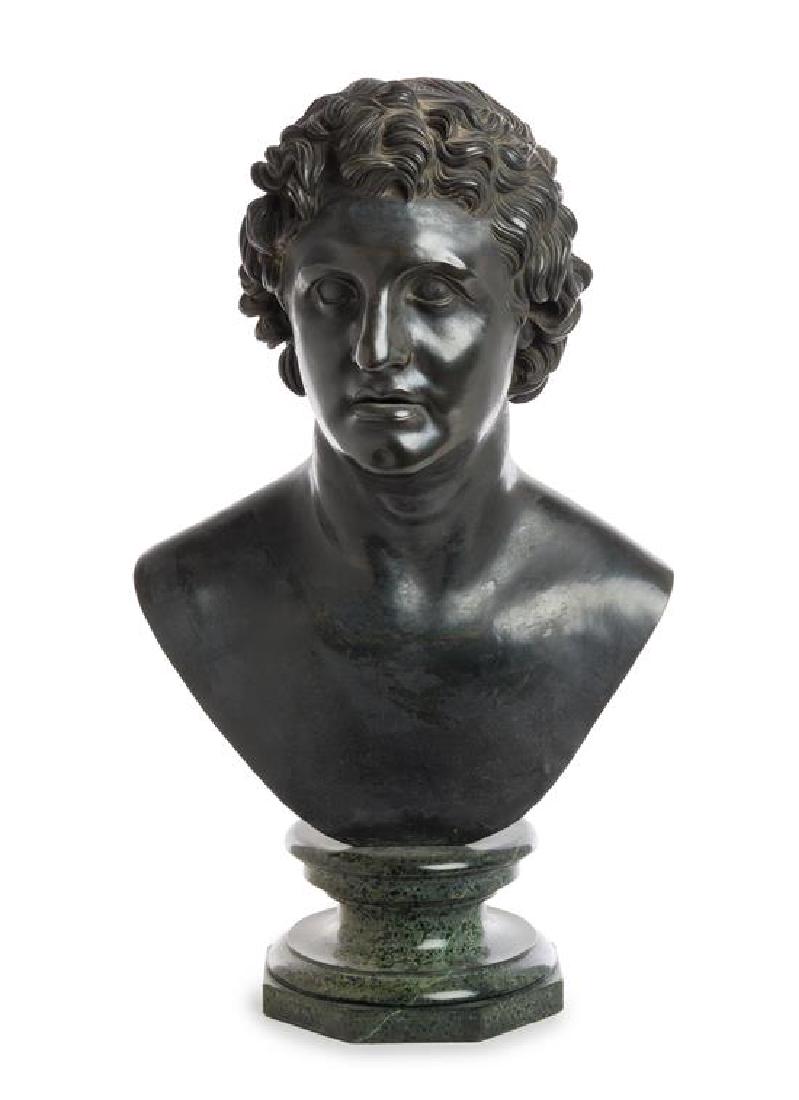 A Continental Bronze Bust: * A Continental Bronze Bust after the antique, 19th century raised on a marble socle. Height 28 1/2 inches. Estimate $ 1,000-1,500 Property from the Collection of Jonathan Hoffman, Chicago, Illinois I