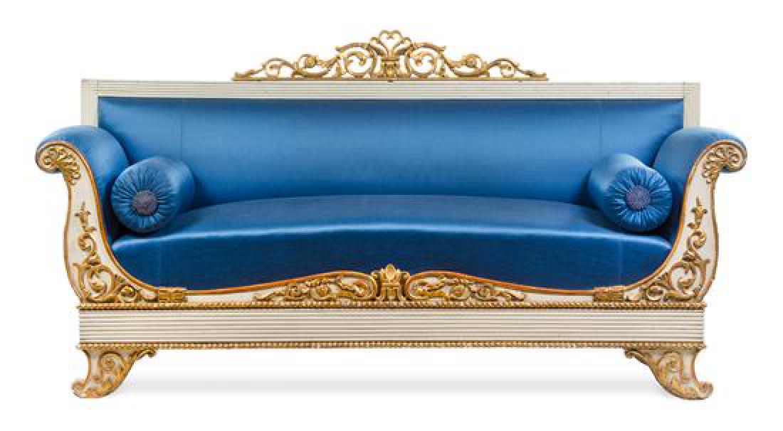 An Italian Painted and Parcel Gilt Sofa: * An Italian Painted and Parcel Gilt Sofa piedmont, circa 1790 the straight reeded crest rail centered with pierce carved foliate scrolls above the padded back, arms and stuffover seat, the reeded sea