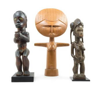 * A Group of Three Wood Figures Height of tallest 24: * A Group of Three Wood Figures 19th/20th century comprising a Fang guardian figure, a Baule figure and a fertility doll. Height of tallest 24 1/4 inches. Estimate $ 1,500-2,000 The Property of the De