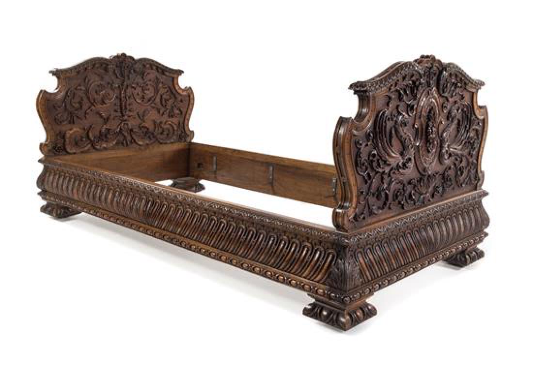 A Renaissance Revival Carved Walnut Bed (1 of 1)