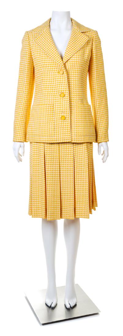 A Givenchy Yellow and Cream Wool Herringbone Jacket and: A Givenchy Yellow and Cream Wool Herringbone Jacket and Skirt Set, comprised of a jacket with a notched collar, front patch pockets and yellow front button closure; together with a matching box pleat