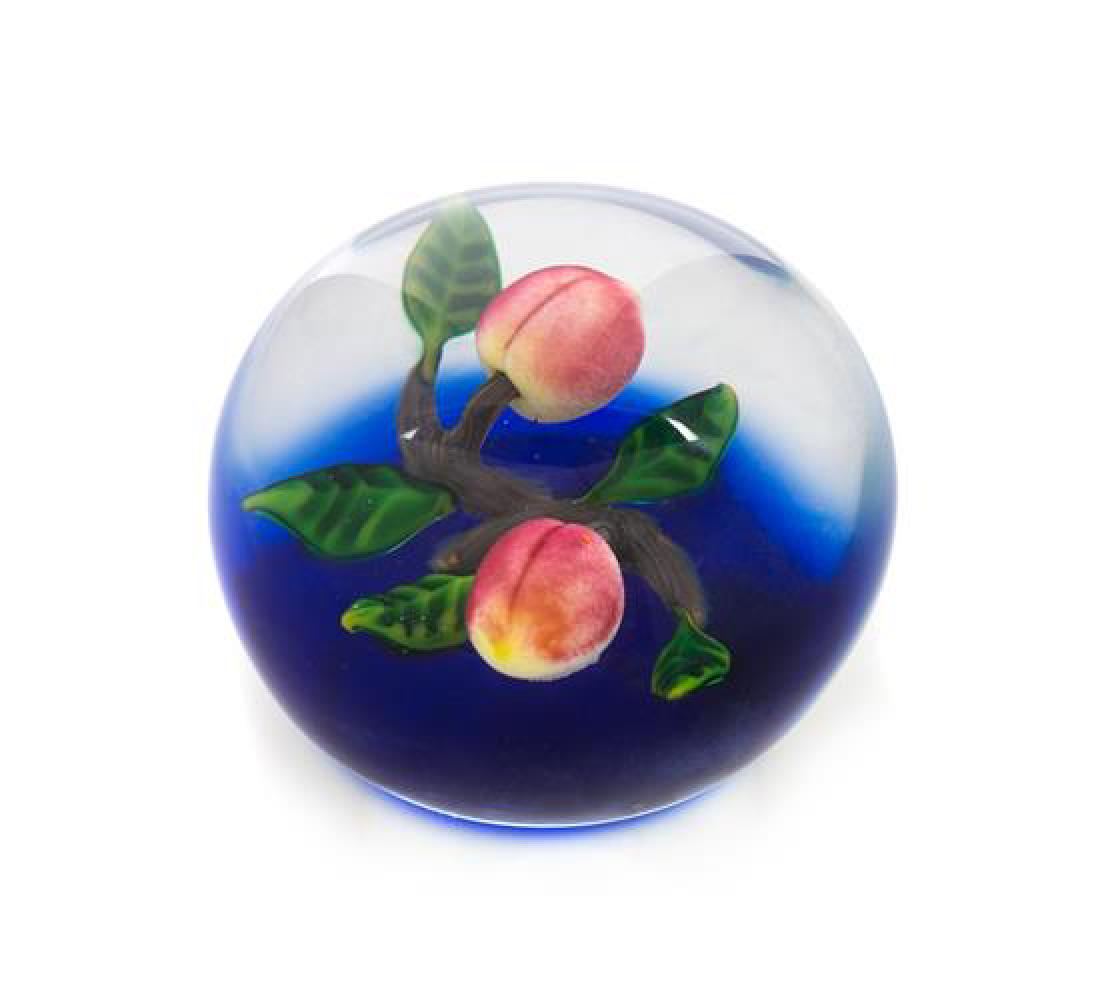 * Delmo Tarsitano, (Italian, 1921-1990), a double peach: * Delmo Tarsitano (Italian, 1921-1990) a double peach paperweight, 1984 signed and dated Diameter 3 1/2 inches Estimate $ 400-600 Property from the Estate of Gerard L. Cafesjian, Naples, Florida