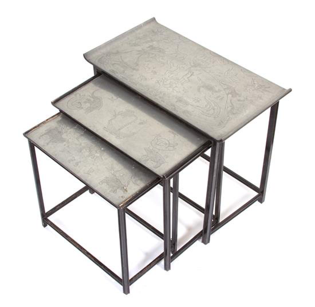 A Nest of Three Chased Pewter Top Tables Height of (1 of 1)