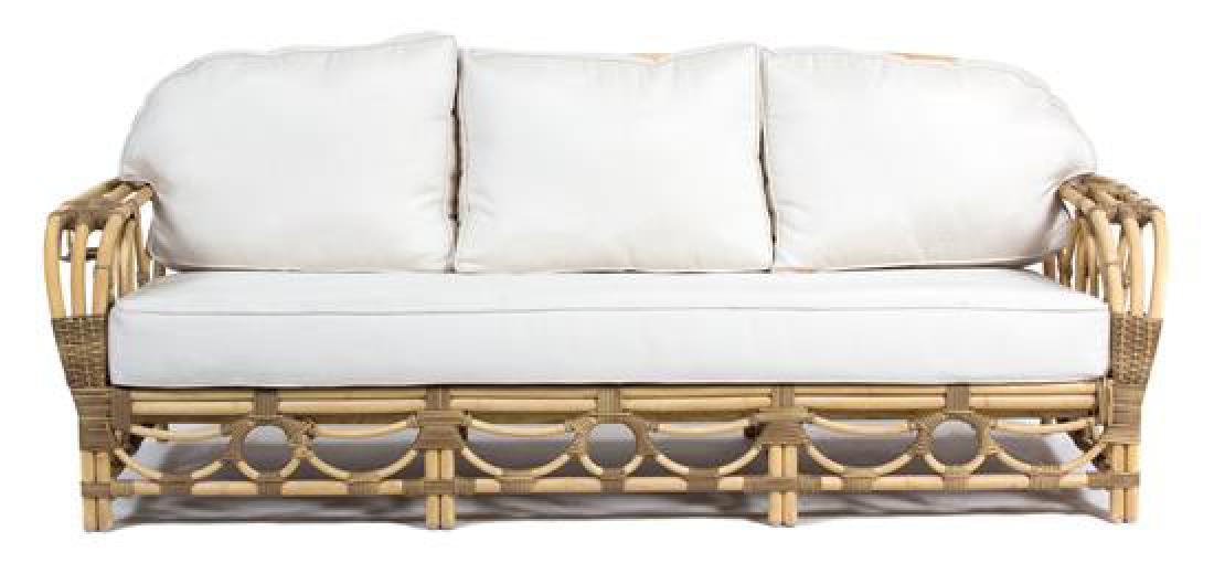 A Rattan Three Cushion Back and Seat Sofa Height 30 x: A Rattan Three Cushion Back and Seat Sofa 20th century Height 30 x length 84 inches. Estimate $200-300