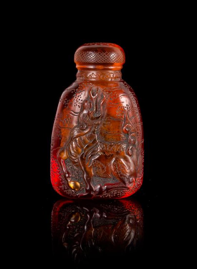A Chinese Amber Snuff Bottle Height 2 3/8 inches. (1 of 1)