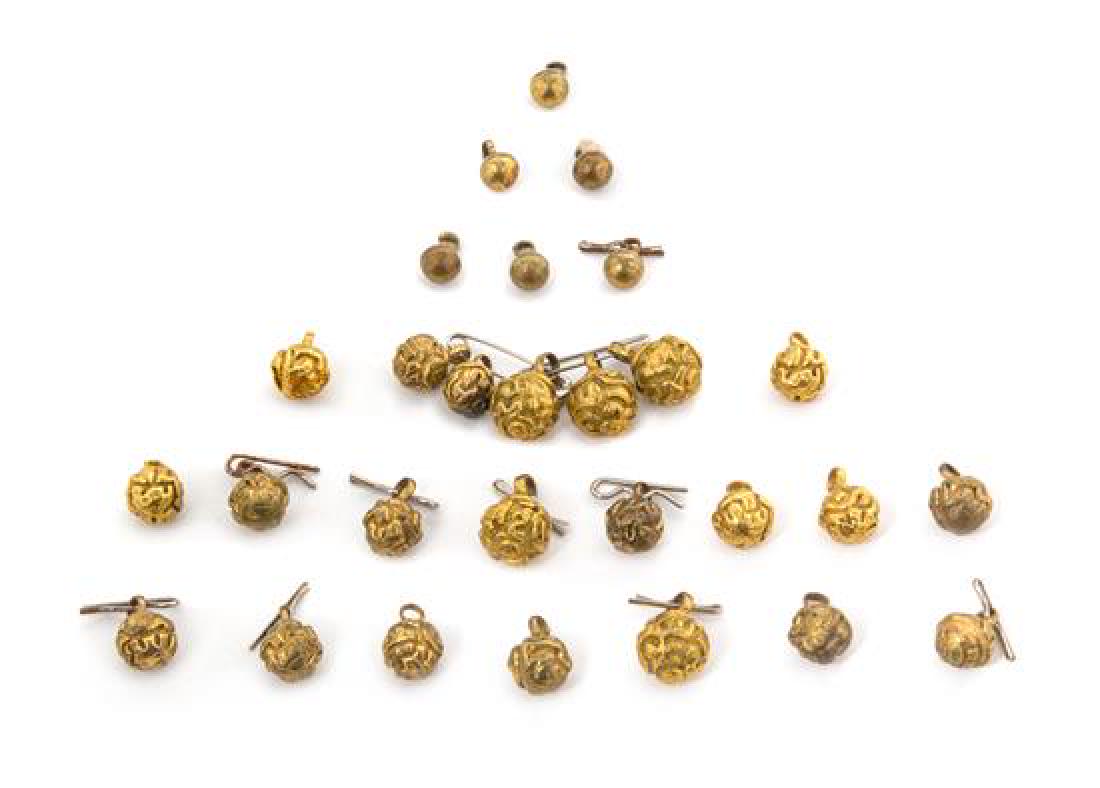 * Twenty-Eight Chinese Gilt Bronze Buttons Weight 2.6: * Twenty-Eight Chinese Gilt Bronze Buttons qing dynasty Weight 2.6 otz. Estimate $80-120 Property from the Estate of Ms. Ruth Ann Koesun, Chicago, Illinois.