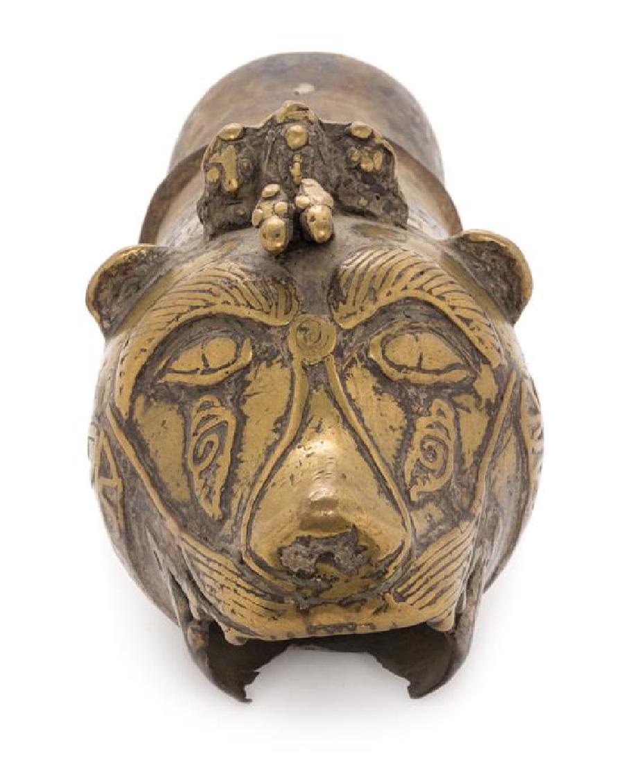 A Nepalese Bronze Fountain Head: A Nepalese Bronze Fountain Head 17th/18th century in the form of a tiger or lion head. Length 11 inches. Estimate $200-300 Property from a Canadian Collection