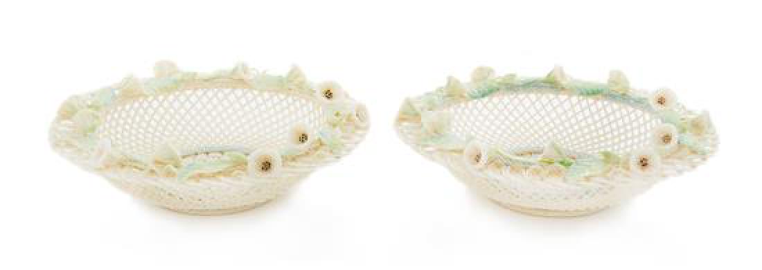 * A Pair of Belleek Four Strand Convolvulus Baskets: * A Pair of Belleek Four Strand Convolvulus Baskets sixth impressed mark (1990-1992) each with applied flowers to the rim. Diameter 9 inches. Estimate $200-400 Property from the Collection of Margaret