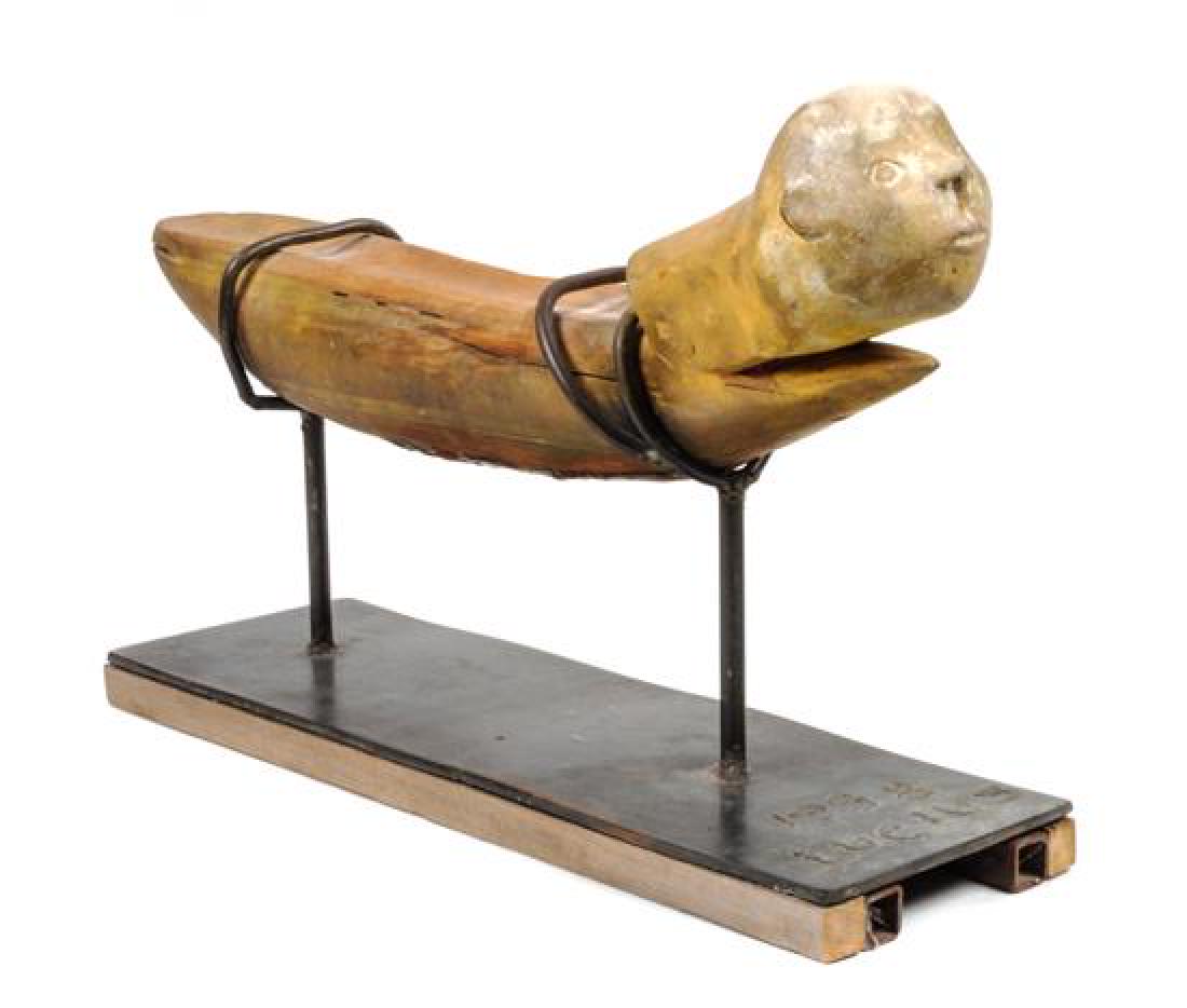 Artist Unknown Height 11 12/ x length 17: Artist Unknown Lucius, 1986, carved wood with applied hide on a cast metal base Height 11 12/ x length 17 1/4 x width 5 1/4 inches Estimate $80-120 Property from the Howard and Catherine Feldman Folk 