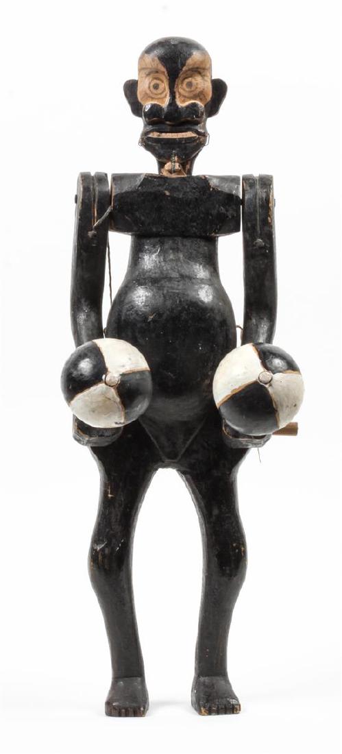 New Mexican Carved and Painted Wood Puppet Height 20: New Mexican Carved and Painted Wood Puppet Height 20 inches Estimate $80-120 Property from the Howard and Catherine Feldman Folk and Southwestern Art Collection