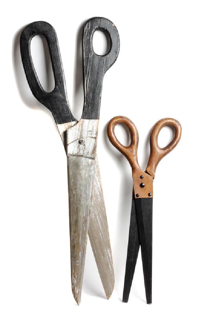 Two Pairs of Oversized Scissors Length of larger 36: Two Pairs of Oversized Scissors Length of larger 36 inches Estimate $150-250 Property from the Howard and Catherine Feldman Folk and Southwestern Art Collection Both piece have functioning hinges and 