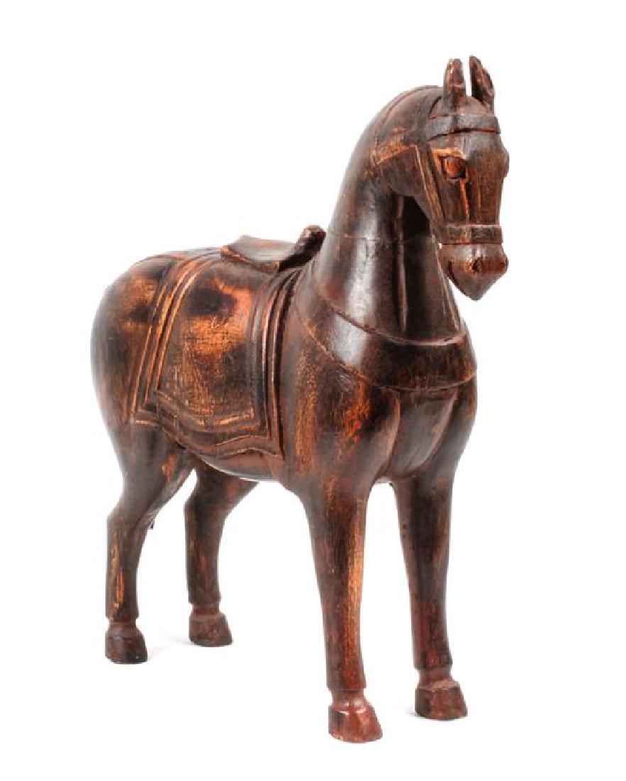 Two Carved Wood Decorative Objects Height of largest 14: Two Carved Wood Decorative Objects including a horse. Height of largest 14 1/2 inches Estimate $80-120 Property from the Howard and Catherine Feldman Folk and Southwestern Art Collection